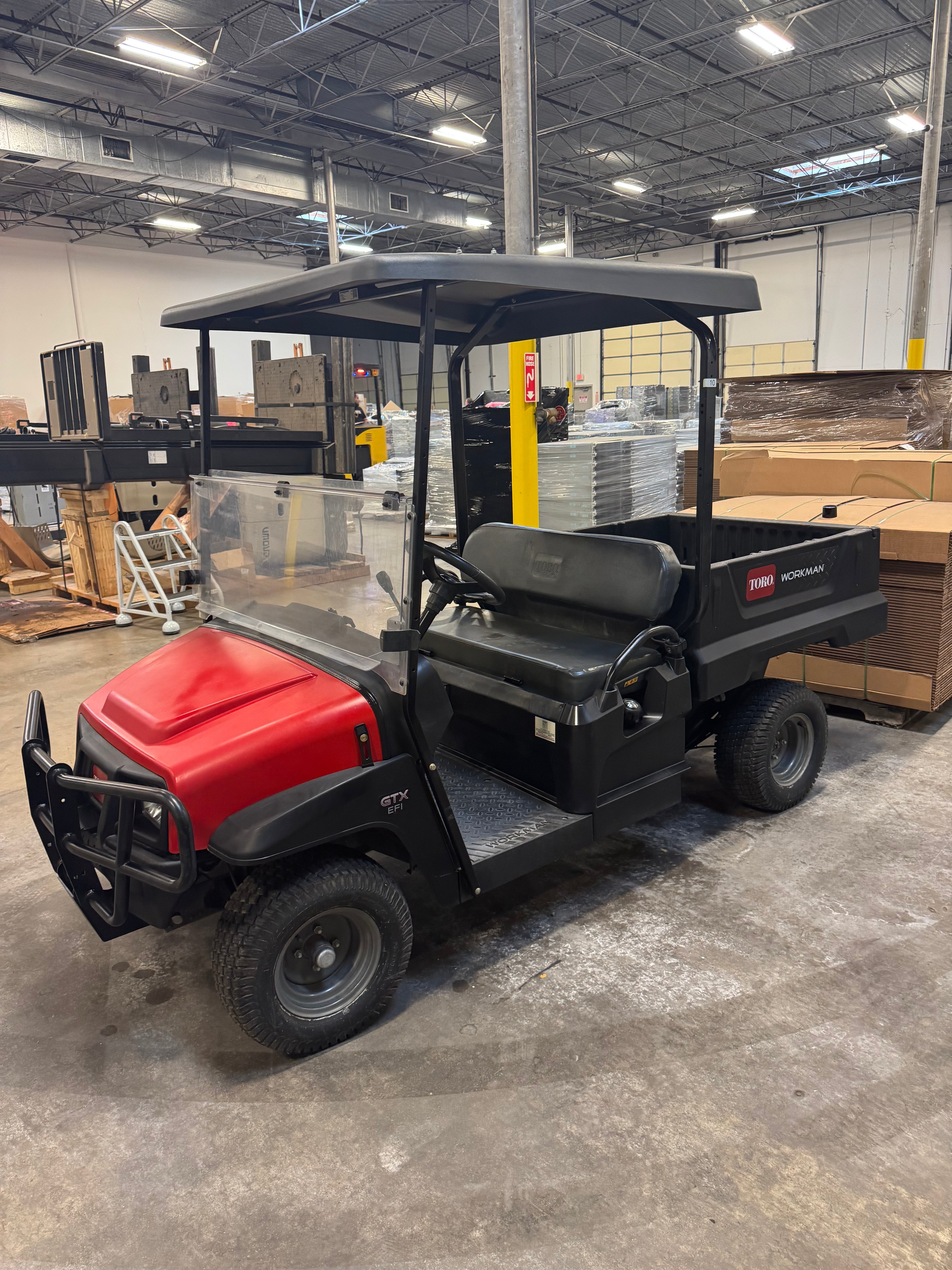 TORO Workman GTX EFI crossover vehicle – side view showing cargo bed